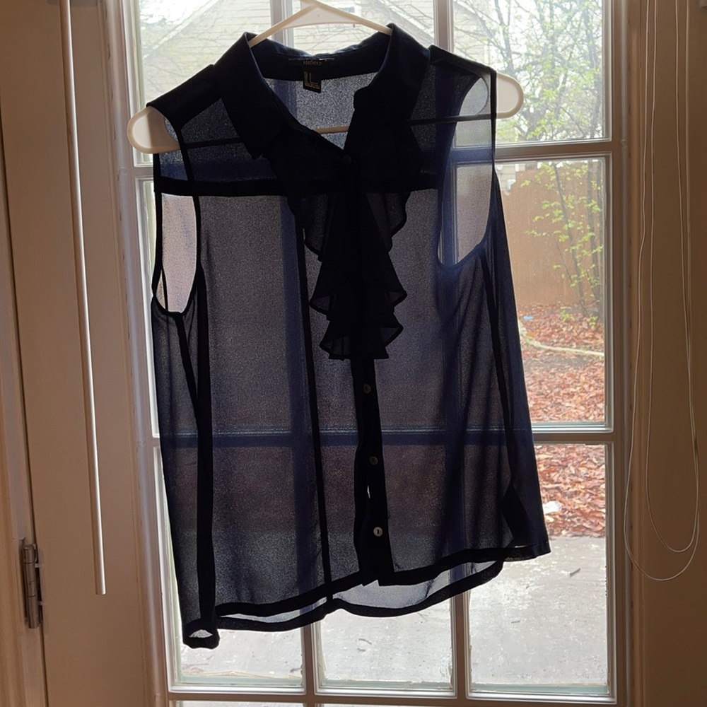 Sleeveless, forever 21 ruffled top.